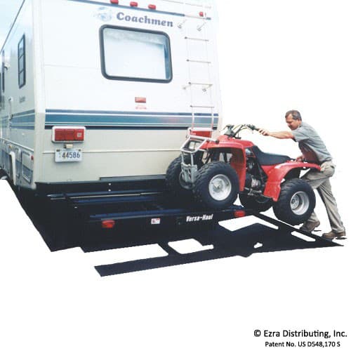 VersaHaul ATV carrier with ramp out loading atv on back of RV