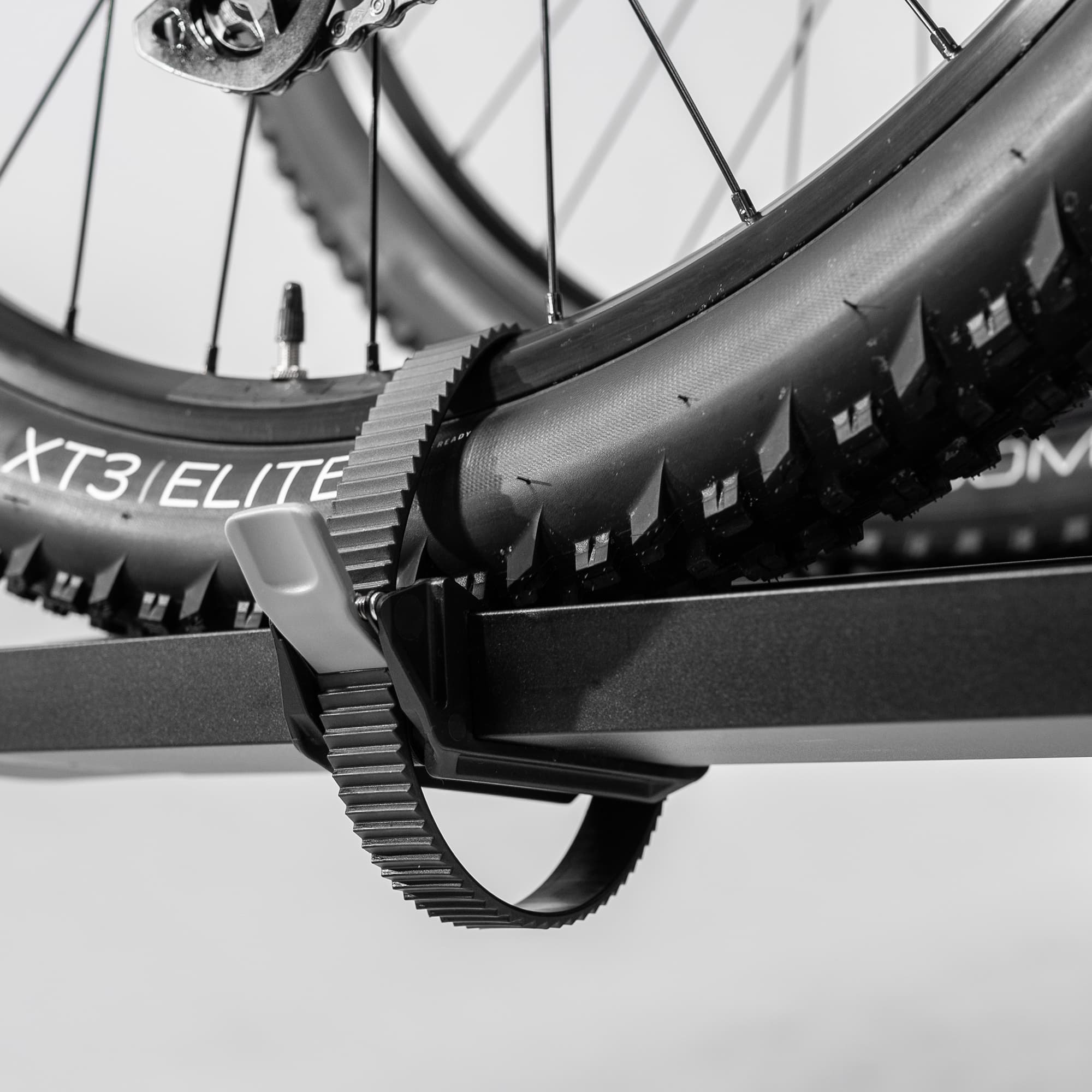 Close-up of SuperClamp G4 strap around wheel